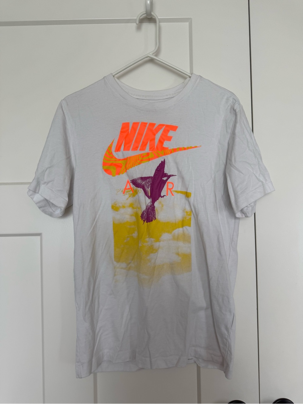 Nike Men’s White Short Sleeve Tee with Neon Orange Swoosh and Yellow Graphic